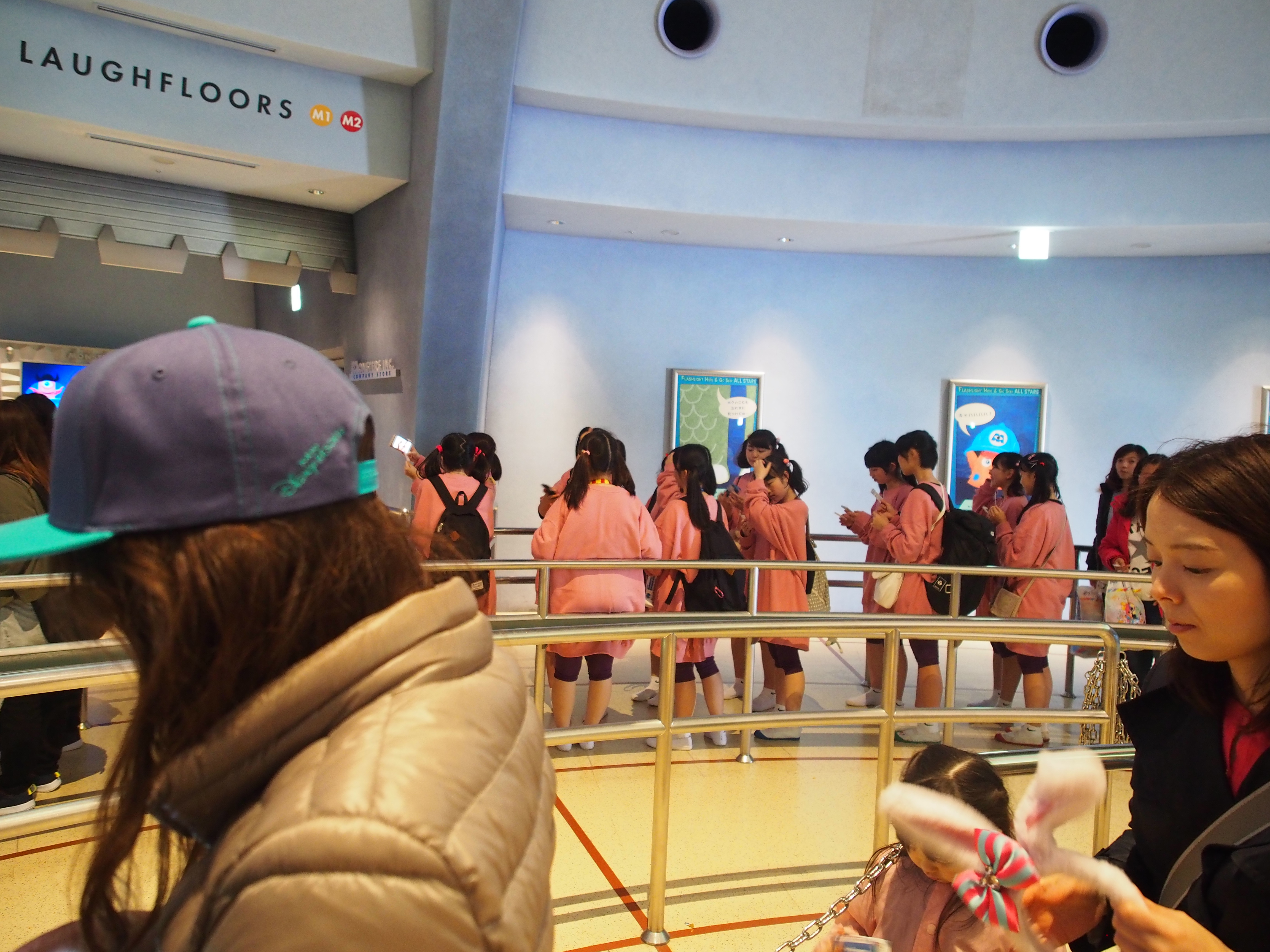Japanese girls waiting in line disneyland