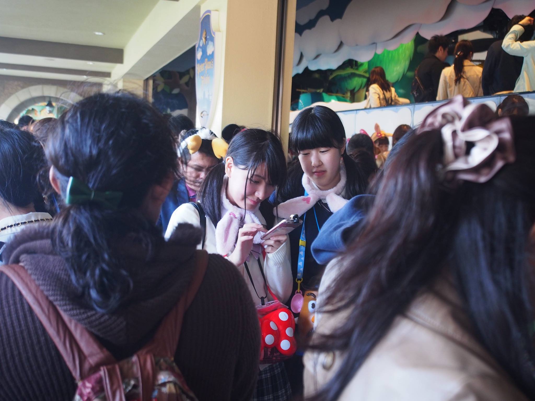japanese women in queue disneyland